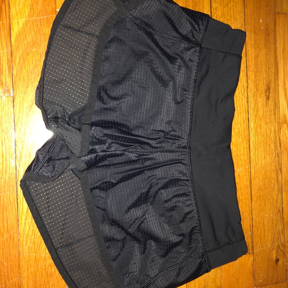 Super cute lululemon black shorts w/ small holes